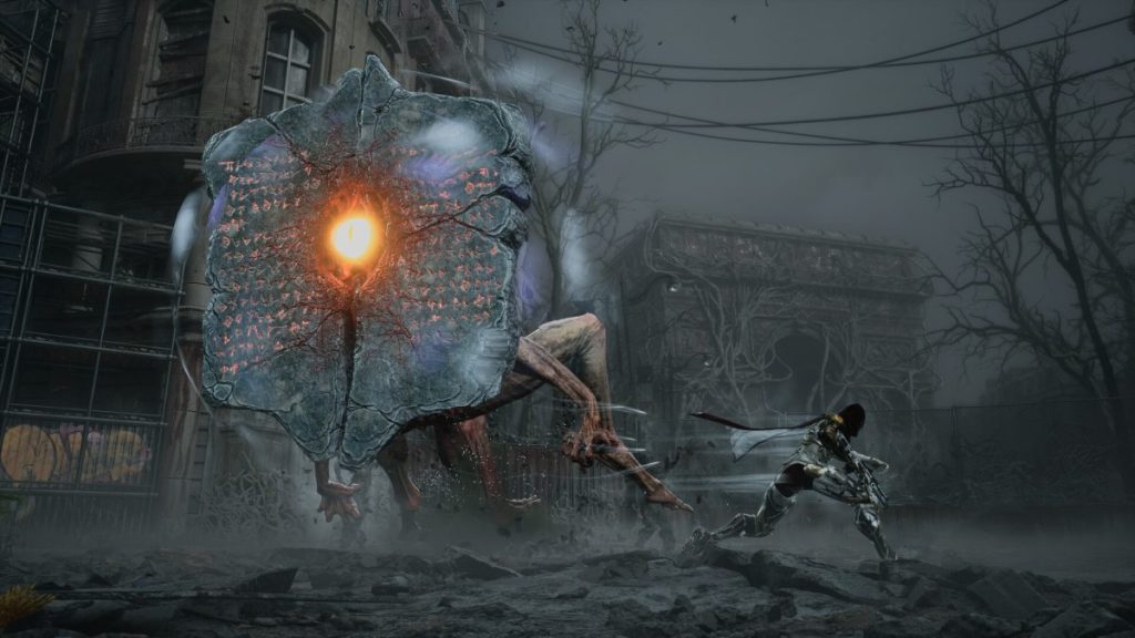 Un personnage combattant une créature massive avec un œil central dans un environnement urbain post-apocalyptique.