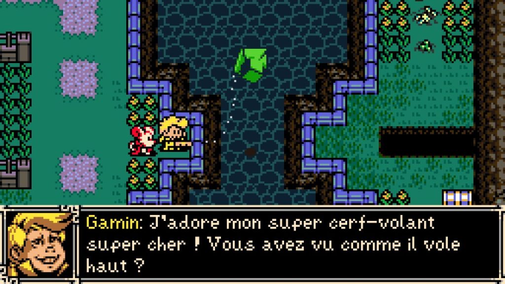 Un personnage souriant discute avec un autre personnage, tandis qu'un cerf-volant vert s'élève dans le ciel. Le dialogue en bas de l'écran mentionne l'amour du personnage pour son cerf-volant.