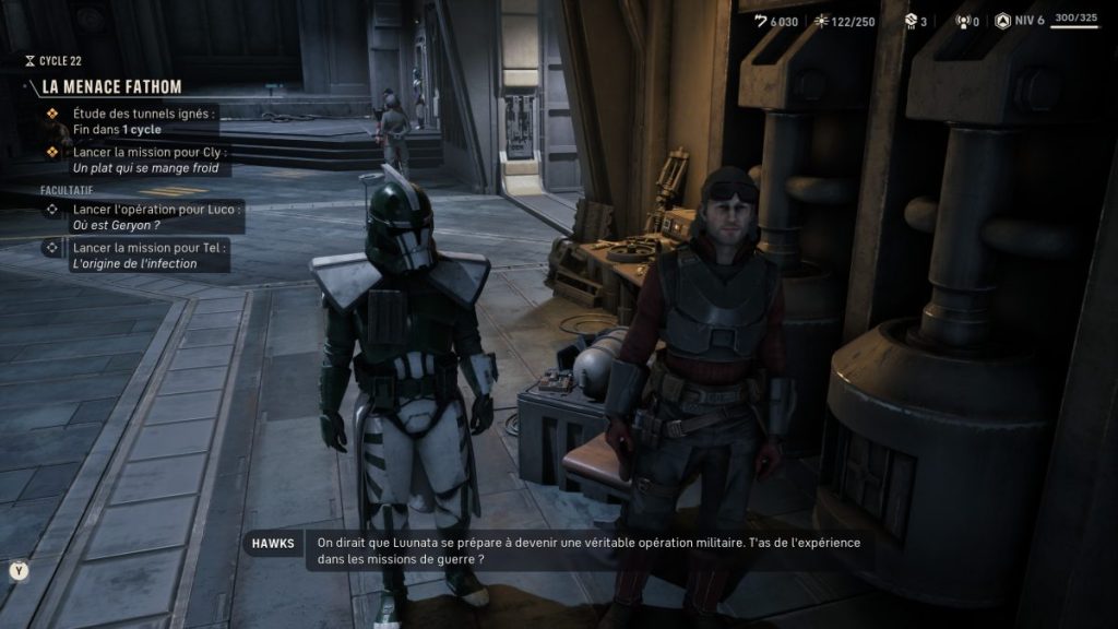 Deux personnages en conversation dans un environnement militaire futuriste, l'un portant une armure et l'autre en tenue de combat. Des éléments d'interface de jeu vidéo sont visibles à l'écran, indiquant des missions à accomplir.