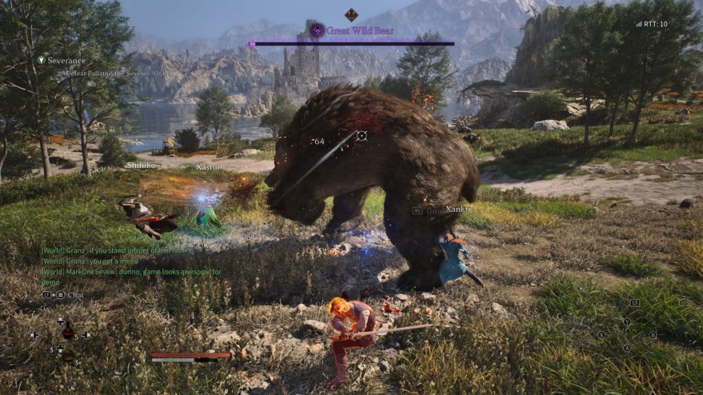 Un groupe de personnages de jeu vidéo combattant un ours sauvage dans un paysage naturel, avec des montagnes en arrière-plan.